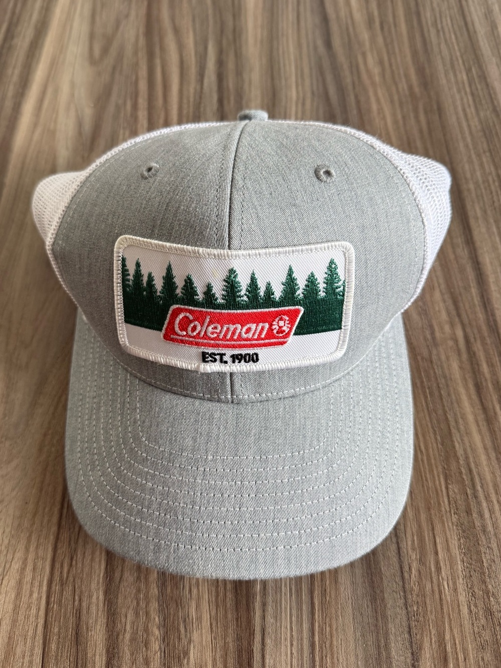 Coleman Light Gray Trucker Hat with Green Forest Patch and Red Logo
